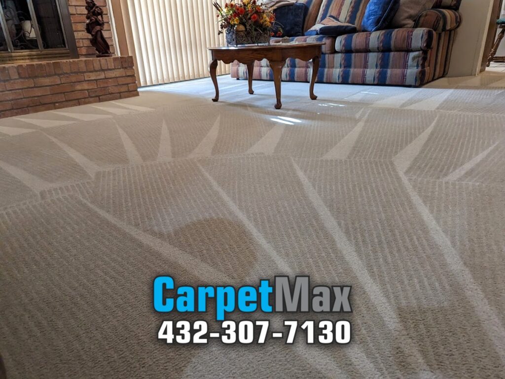 Clean upholstered sofa and freshly cleaned carpet in a Midland, TX living room